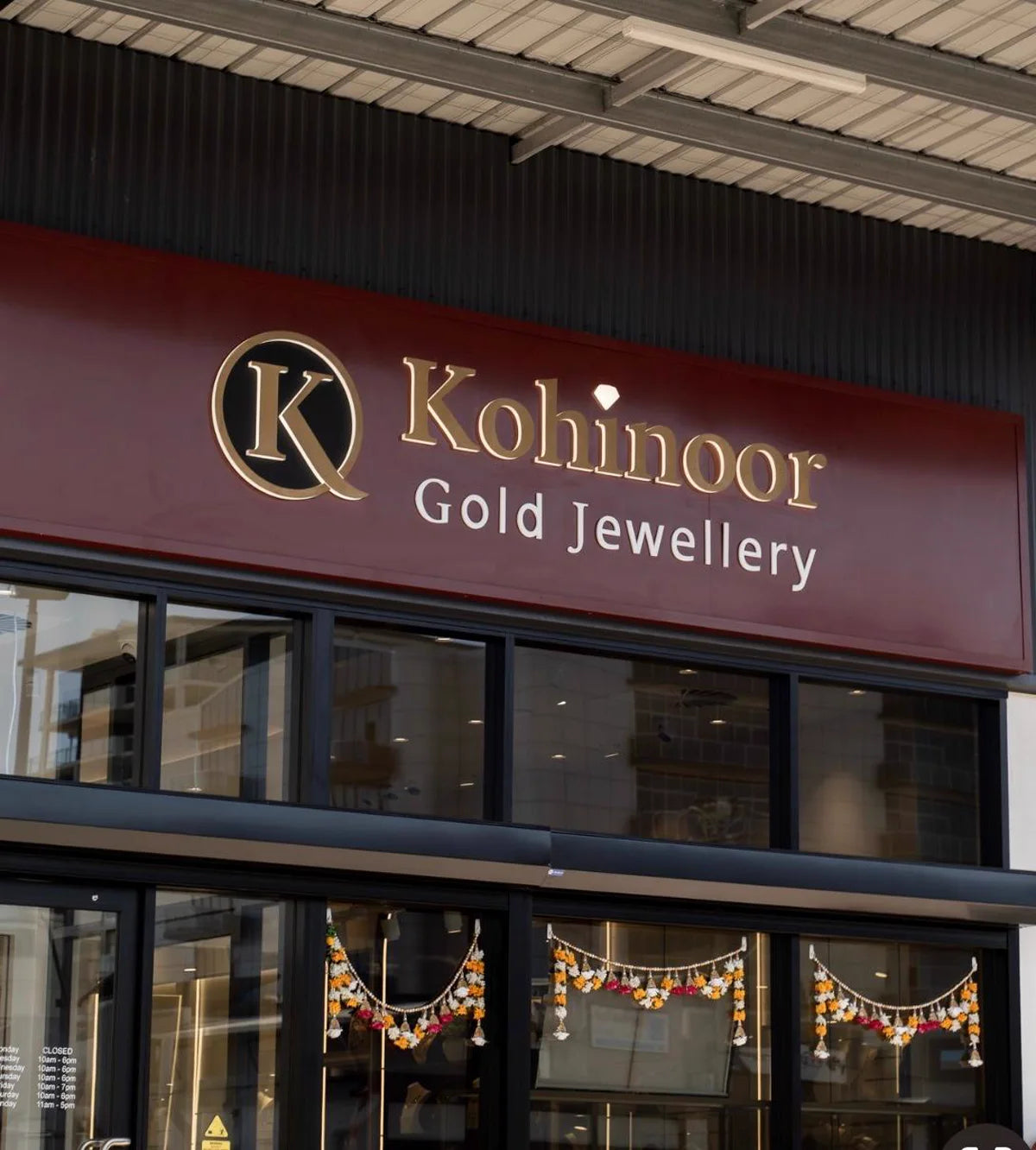 Close view of the Kohinoor Gold Jewellery storefront sign