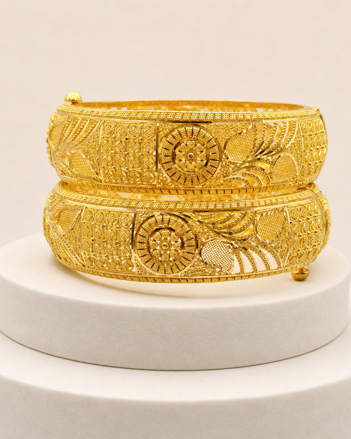 Sunburst Leaf Bangle Pair in 22ct gold — view 1