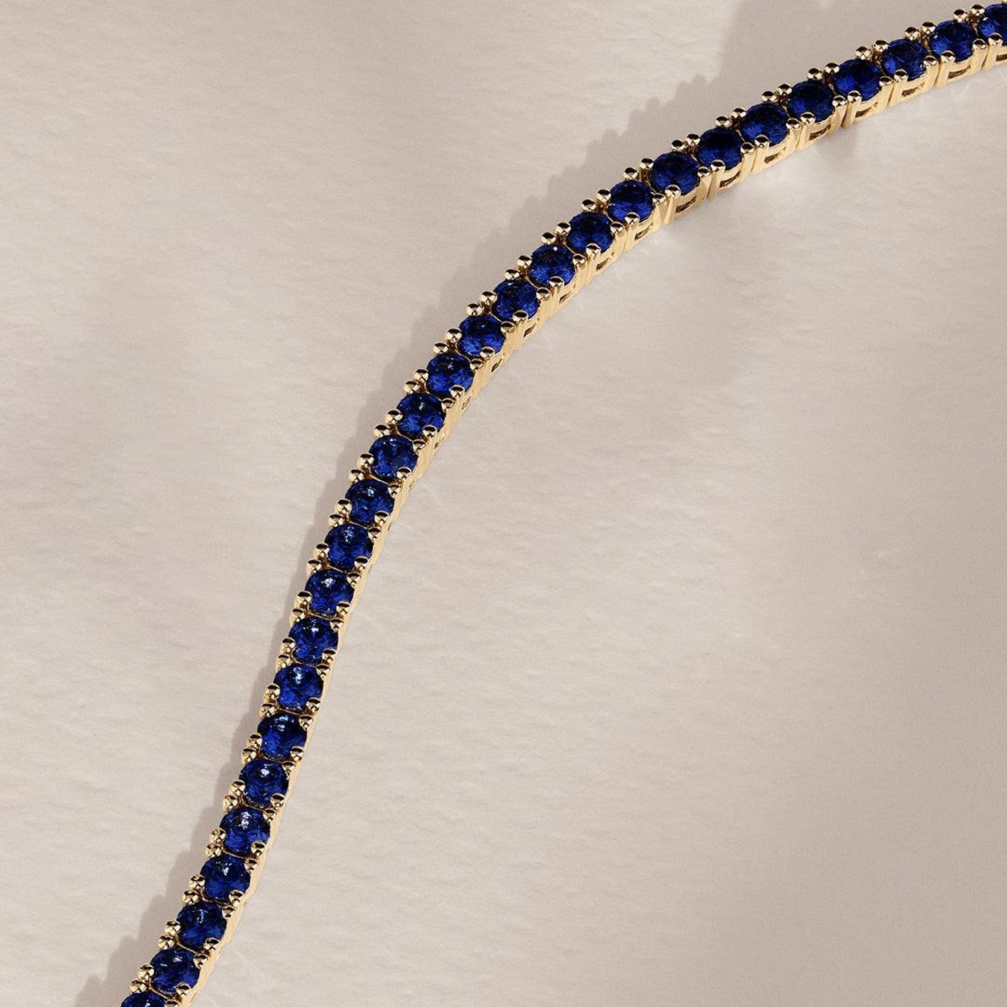 Created Sapphire Tennis Bracelet in 9ct Yellow Gold