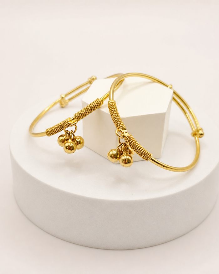 Bell Charm Baby Kada Pair in 22ct gold — view 1