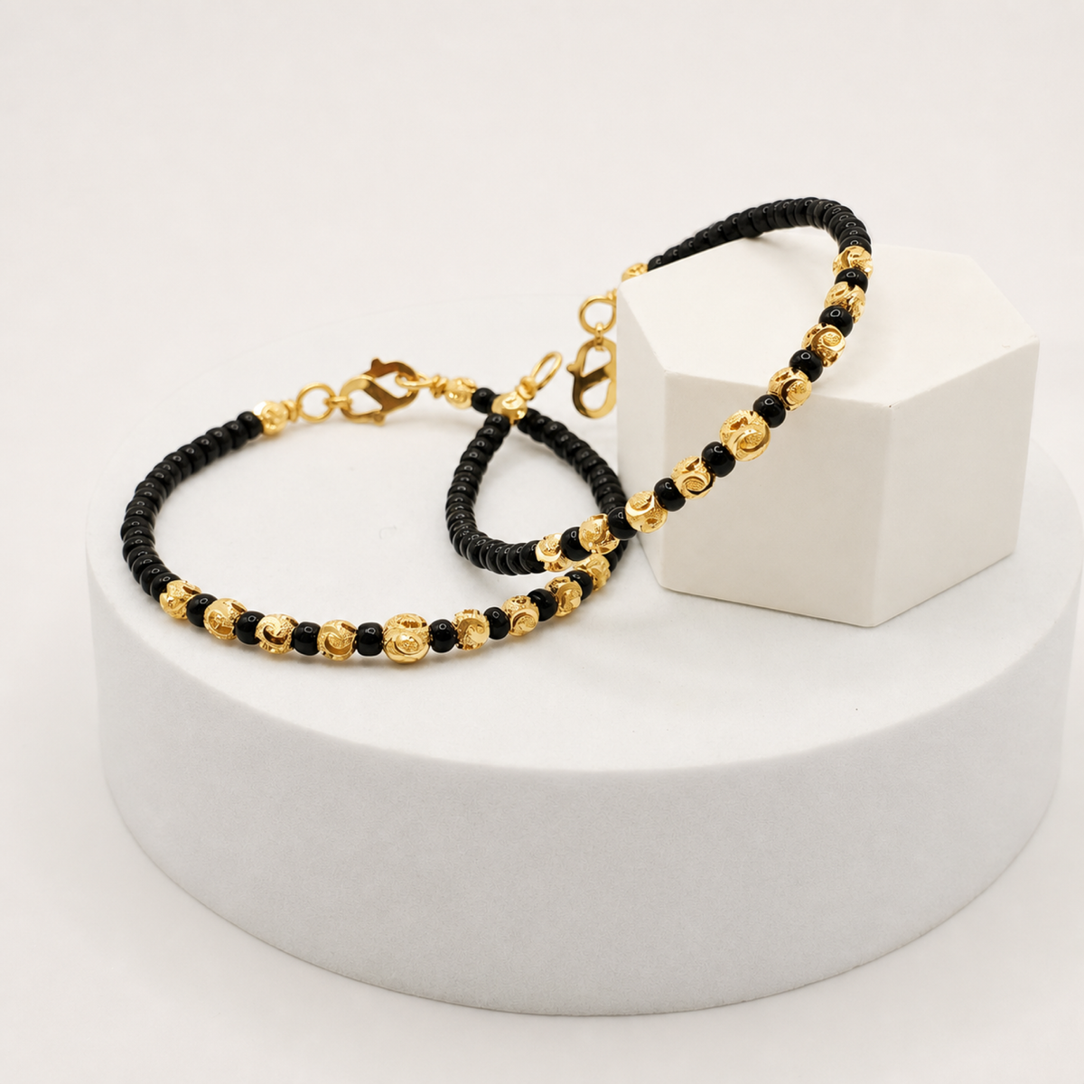 Black and Gold Baby Kada Pair in 22ct gold — view 1