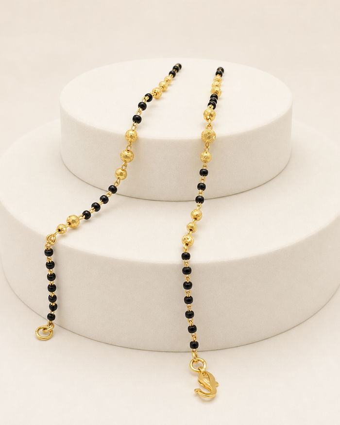 Black Bead Baby Bracelet Pair in 22ct gold — view 1